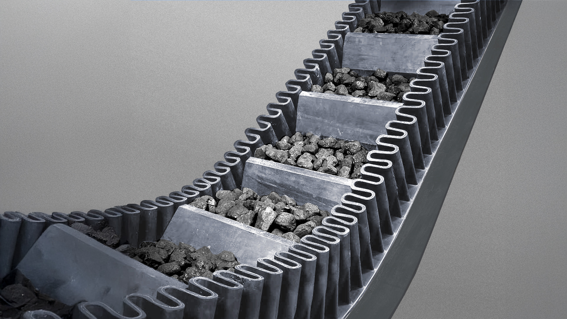 Wellkantengurtförderer